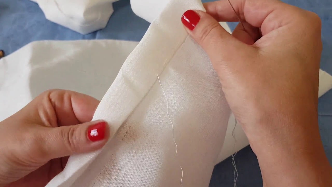Cómo hacer el dobladillo de un vestido a mano